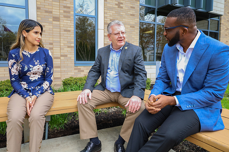 Business professors in discussion
